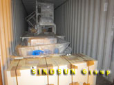 QT8-15 concrete block machine loaded into container